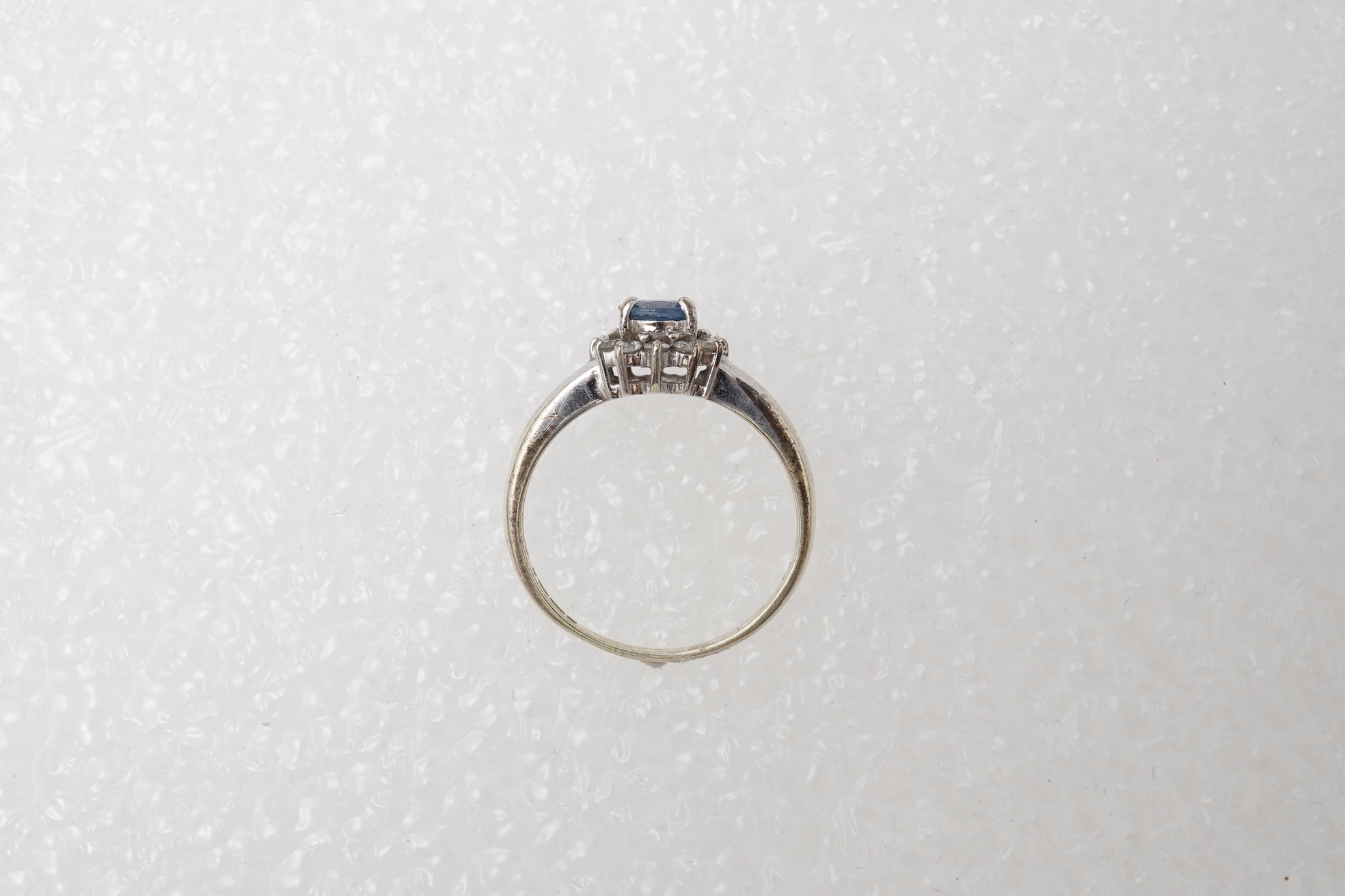 A sapphire and diamond cluster ring